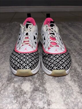 Woman’s Jordan’s Athletic Sneakers in White, Black & Hot Pink